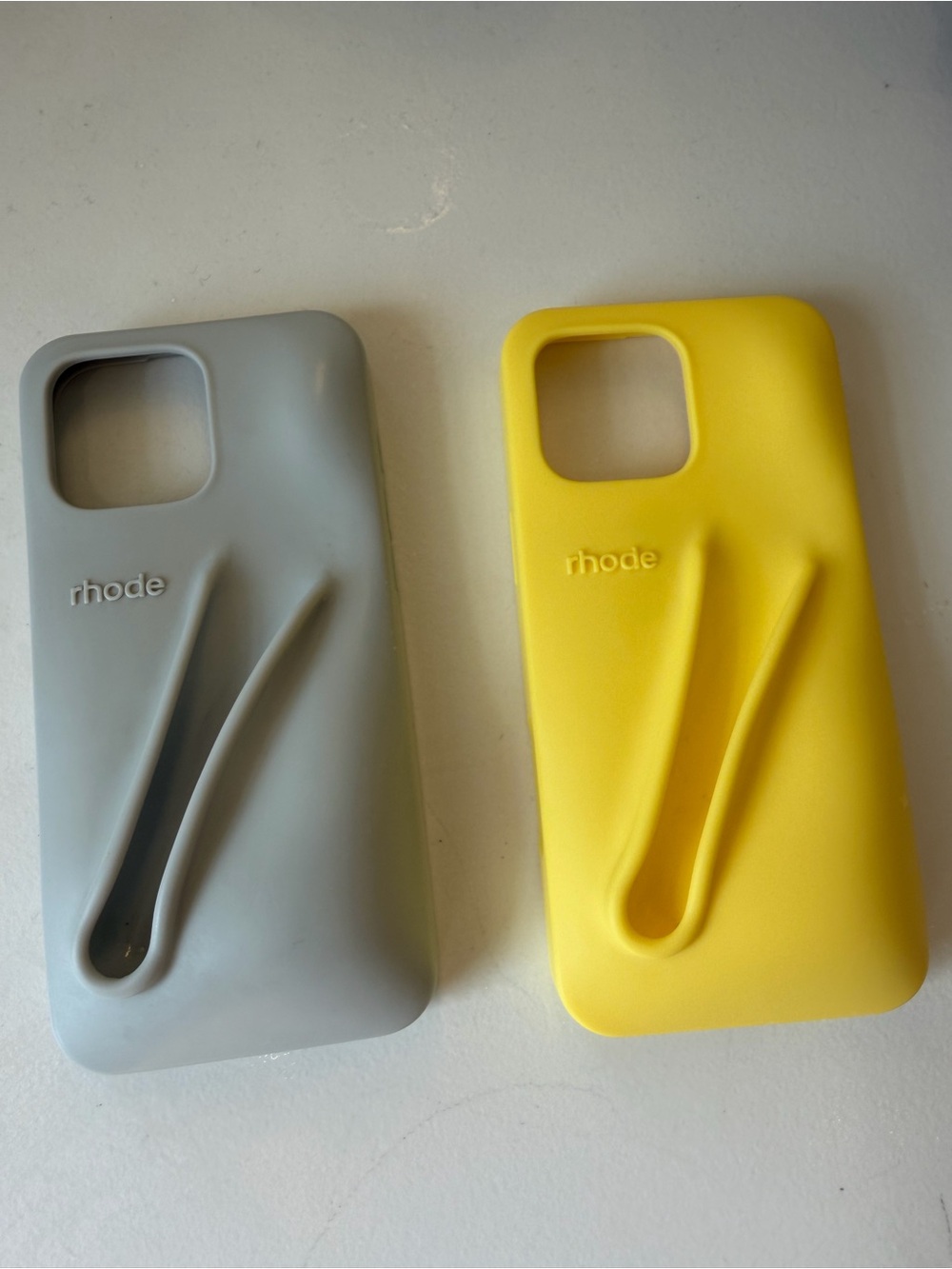 RHODE Silicone iPhone Case Set in Yellow and Gray with Integrated Hand Groove